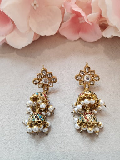 VINANTI MANJI JEWELRY - Featuring a pair of gold finish jhumka earrings studded